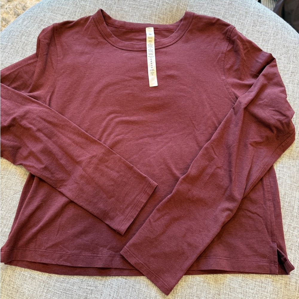 Lululemon classic fit long sleeve.  Women’s size 6.  Color garnet/maroon